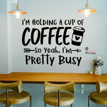 Load image into Gallery viewer, I'm Holding A Cup Of Coffee So I'm Pretty Busy Wall Decal