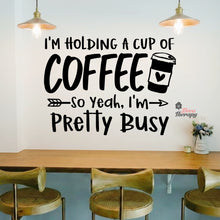 Load image into Gallery viewer, I'm Holding A Cup Of Coffee So I'm Pretty Busy Wall Decal