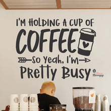 Load image into Gallery viewer, I'm Holding A Cup Of Coffee So I'm Pretty Busy Wall Decal