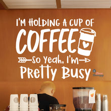Load image into Gallery viewer, I'm Holding A Cup Of Coffee So I'm Pretty Busy Wall Decal